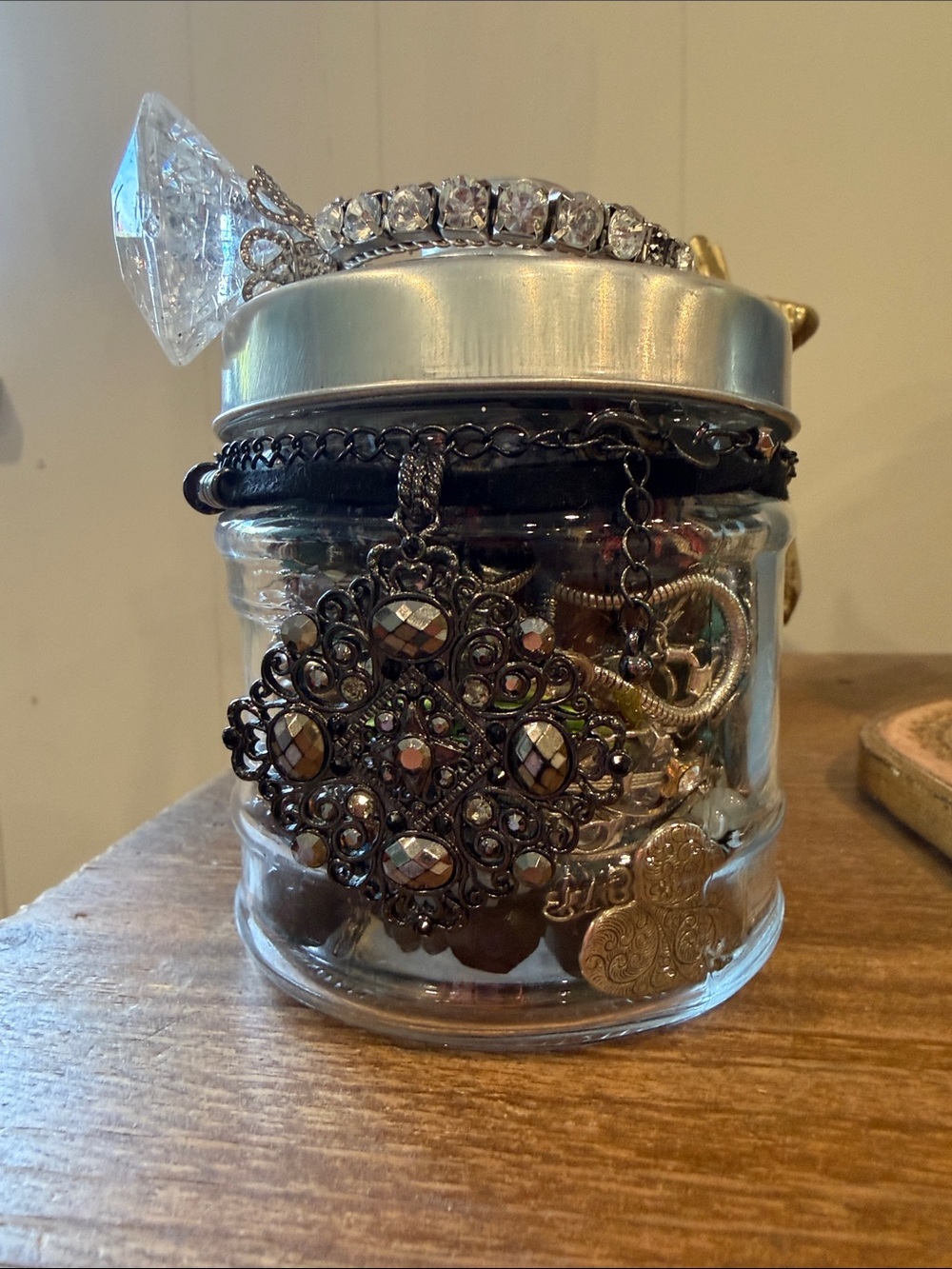 Silver and black topped with crystal greens and blues mystery jewelry jar - fave
